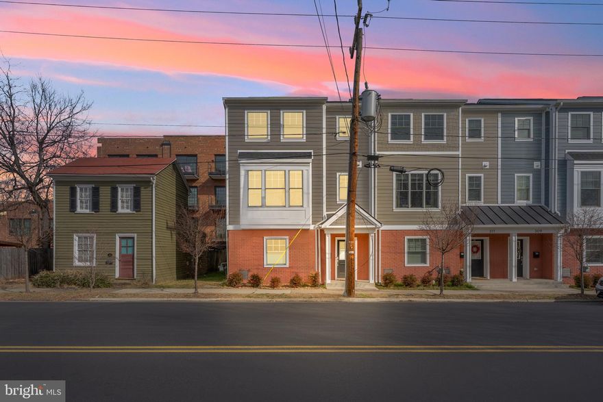 Modern design meets historic surroundings in this stunning 4 year old end-unit townhome, ideally located in downtown Fredericksburg. You would not just be purchasing a beautiful home, you would be purchasing a low- maintenance lifestyle. Your free time will be open to enjoy your hobbies. Yard work would be a chore of the past. 
Thoughtfully upgraded throughout, the main living level offers an open, seamless flow perfect for everyday living and entertaining. The gourmet kitchen is a showstopper with quartz countertops, stainless steel appliances and a center island open to the adjacent family room. Sliding doors open to a low-maintenance rear deck, extending the living space outdoors. A separate dining room and living room with cozy fireplace complete this level, all designed with an airy, connected feel.
The primary suite is a true retreat, featuring a spacious walk-in closet and a luxurious bath with heated floors and an oversized shower. Two additional bedrooms share a well-appointed Jack-and-Jill bath, and a conveniently located laundry closet adds everyday ease. Custom blinds that open from the top or bottom are enjoyed throughout.
The ground level includes access to the two-car garage and a flexible den space that is perfect for hobbies or a home office. 
Just a few blocks from the train station, restaurants, shops, and the Rappahannock River, this home offers the perfect blend of modern comfort and vibrant downtown living.