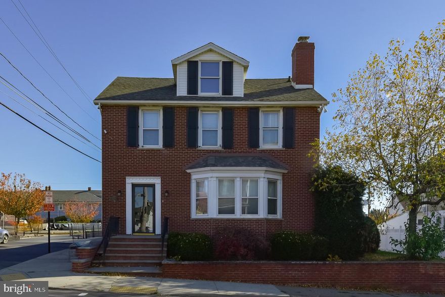 This all-brick home is beautifully & thoughtfully updated. The living room has a cozy fireplace, the kitchen has gorgeous cabinetry, large island w/additional oven & room for seating, making it a perfect place to gather. Upstairs are 4 bedrooms; The sunroom off the master is the perfect place to enjoy your morning coffee. The full bath is nicely updated and features a jetted tub.