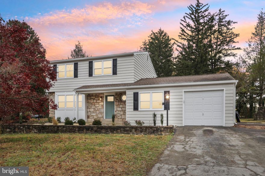 Introducing a beautifully renovated 4-bedroom colonial that blends timeless charm with modern luxury,  a true move-in-ready gem on a spacious lot!  From the moment you arrive, the inviting covered front porch and oversized driveway set the tone for comfort, convenience and style. Step inside to find brand-new engineered hardwood floors, fresh paint throughout and a bright, open layout that feels warm and welcoming. The entryway features a double-door coat closet and leads into the expansive living room, filled with natural light from three large windows. The space flows effortlessly into the dining room, creating an ideal setting for both everyday meals and special gatherings. The completely updated kitchen is sure to impress, offering a 5 burner gas stove with griddle, new stainless steel appliances, quartz countertops, soft-close white shaker cabinets, gorgeous tile backsplash, a wood accent built-in and garbage disposal. Thoughtful design meets modern function in every detail!  Adjacent to the kitchen is a convenient powder room and a spacious family room, accessible from both the entry and kitchen. This flexible area features two windows and direct access to the huge screened-in sunroom with two exits   perfect for morning coffee, summer dinners or simply unwinding. Upstairs, the beautifully renovated main bathroom showcases double sinks, a large vanity mirror, tile flooring and a stylish subway-tile tub/shower surround. Four generously sized bedrooms, each with ample closet space, complete the upper level, along with a hallway linen closet and pull-down attic stairs for additional storage. Classic touches such as high baseboards, 5-panel doors and double closet doors add character and craftsmanship throughout. The 21x17 finished basement offers endless possibilities, whether you envision a home gym, playroom, studio or additional living space, it's already there and finished for you! A very spacious laundry room with new GE washer and dryer adds to the home's convenience. Additional upgrades include: NEW HVAC, NEW windows, 200-amp electrical system, Recessed lighting throughout and black wrought-iron railings. This is truly a turnkey home — just unpack your bags and enjoy your beautifully finished new space. All of this and close to shops, schools, Norristown Farm Park, Einstein Hospital, public transportation and more! Don’t miss this incredible opportunity to own a fully renovated home with modern amenities, thoughtful design, and room to grow. This one won’t last long!