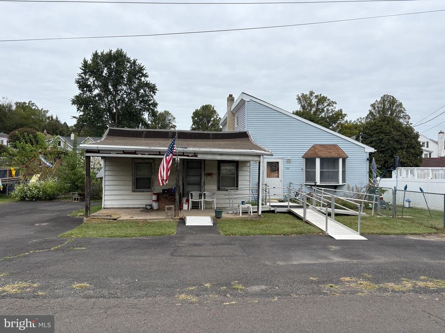 Calling investors. Cash only. Likely a tear-down on a a great lot in an established neighborhood. A freestanding building with a full bath, kitchen and was built next the original bungalow which has been closed up for many years where the roof has been leaking. Bungalow portion of  home is not safe to enter.