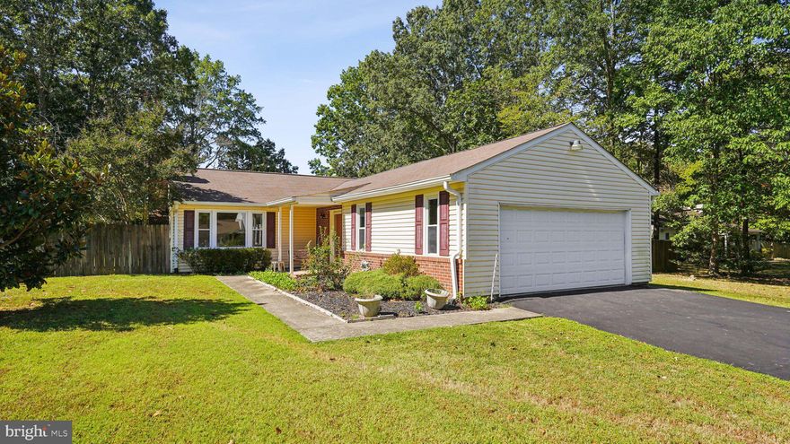 Welcome to 12 Vista Woods Rd! This charming 3-bedroom, 2-bath ranch-style home offers 1,870 sq ft of one-level living with no HOA. Inside, you’ll find a large kitchen with granite countertops and plenty of space for cooking and gathering, along with a cozy wood-burning fireplace perfect for relaxing evenings. The three bedrooms provide comfort and flexibility, while outside, the beautiful fenced-in backyard has a park-like feel—ideal for pets, gardening, or entertaining. The property also includes three sheds, offering ample storage and workspace.

Conveniently located near commuter lots, I-95, shopping, and restaurants, this home offers both comfort and accessibility. Being sold as-is, it presents a wonderful opportunity to add your personal touches and make it your own.