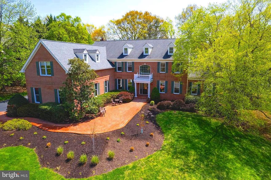 Welcome to 12825 Parapet Way, an exceptional Toll Brothers Colonial nestled in the prestigious Oakton Chase community. This stately residence sits majestically on a beautifully landscaped .83-acre cul-de-sac lot and offers unparalleled curb appeal in a peaceful and private setting, yet in a friendly neighborhood with sidewalks and tree lined streets.  The property boasts 5 bedrooms, 4.5 baths and a rarely available four-car side-load garage.

A gracious paver walkway leads you to the front entry, where you can stop to enjoy breathtaking sunset views from the front patio.  Upon entering the home you will be greeted by the elegant foyer with sweeping staircase and marble floors.  Natural light floods the home, highlighting the walls of windows, high ceilings and lovely formal and informal spaces.  The conservatory with vaulted ceilings, arched windows and fireplace will be a favorite place to gather.  Host holidays in the massive dining room and enjoy the expansive gourmet kitchen with sunroom and a walk in pantry.  The family room impresses with floor-to-ceiling Palladian windows and a striking stone fireplace, complemented by a convenient back staircase.  The library and mudroom round out the functional and flowing main level.

On the upper level, the desirable four-bedroom, three-bath configuration includes a luxurious primary suite with tray ceiling, cove lighting, a double sided fireplace, plus a sitting room, enormous dual walk-in closets, and a dressing area with mirrors and vanity. The lux primary bath features a soaking tub and walk-in shower with marble surround,  and dual vanities. Completing the upper level are two spacious bedrooms that share a buddy bath, and a guest bedroom with ensuite bath and walk-in closet.

The lower level is a haven for relaxation and entertainment, with an expansive rec room, full bath and an in-law suite with a sitting area. Plenty of flex space and storage are an added bonus.  Double doors lead to a private patio and the backyard.

Outdoor spaces are designed for relaxation and gathering, with so many options - barbecue on the back porch, relax in the gazebo, watch sunsets from the front patio and enjoy nature view  and the lower level patio offers a private retreat. The huge yard is perfect for play or pets or set up goals for a soccer match!  There are plenty of options for pool placement should one be desired.

This property is part of the coveted Navy, Franklin, Oakton school pyramid, making it an ideal choice for those seeking top-tier education.   The location is superb being equidistant from the popular restaurants and shopping at Reston Town Center and Fairfax Corner.  Excellent commuter options with easy access to the Fairfax County Parkway, and highways 28, 50, 66 and 495.  Minutes to the Dulles Airport.  

Experience the perfect blend of elegance, comfort, and functionality at 12825 Parapet Way. Don't miss the opportunity to make this exceptional residence your new home.  Open houses Friday 5-7pm, Sunday 1-4pm.