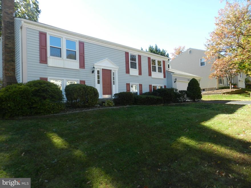 I AM GORGEOUS AND READY FOR YOU TO MOVE IN! Gleaming hardwood floors anchor the LR,DR, Kitchen and Entry. Custom cabinetry, stainless steel appliances and custom designer mosaic backsplash makes this eat in kitchen a chef's delight. Designer choice porcelain tile, new lighting fixtures, vanities, tubs and mosaic tiles make these new baths give you a spa experience. NEW DECK and FENCED IN BACK YARD