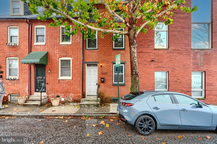Charming and updated three level rowhome in the heart of Baltimore! Nestled in a prime location, just a short walk from Johns Hopkins Hospital’s main building, the School of Nursing, and the School of Medicine. The first level boasts a thoughtful layout that blends together seamlessly. This home features engineered wood floors, a new HVAC system, and an updated kitchen with stainless appliances. Enjoy breathtaking rooftop views of downtown and a large fenced backyard perfect for a private oasis retreat. Walk to bars, restaurants, and shops, with Fells Point just a short stroll away. Full basement provides extra storage. Modern updates meet urban convenience!