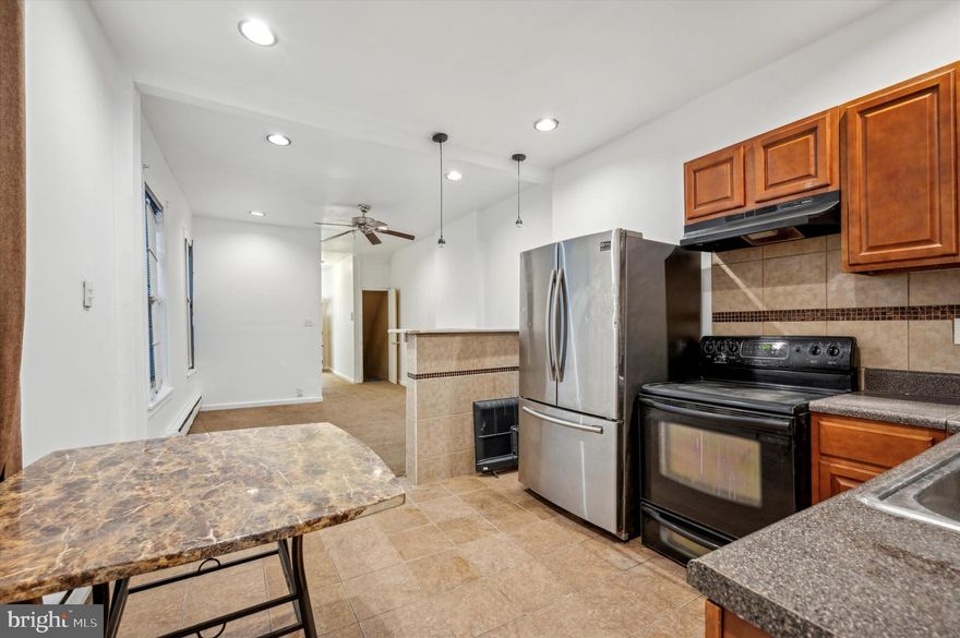 Duplex For investor or owner occupant ! Our 1st floor unit features 2 beds/ 1.5 baths and has been recently vacated to aid in an owner occupant scenario.  This unit lays out with the 2 bedrooms in the front followed by a full bathroom with stand up shower leading to a carpeted living / dining room with recessed lighting into an eat in kitchen with ceramic floor & ceramic backsplash. You ll then make your way into a spacious laundry room with access to a huge backyard. This unit includes a finished basement with a half bathroom ideal for extra storage or as an entertainment space.  Our upstairs unit consists of 2beds/1bath on the 2nd floor & 2beds/1bath on the 3rd floor totaling 4beds/2baths. Kept in good condition by previous tenants which was rented month to month at $1200 with ceiling fans, carpeting and radiator heat throughout ( electric baseboards in 1st floor unit ). Solid opportunity for the savvy owner or investor, ready to go ! Stone's throw to Broad st, right off of Temple campus, quick access to 76 & Roosevelt Blvd, make your appointment today !