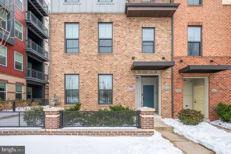 Spacious, contemporary 3-bedroom, 2.5-bath townhome offering 2,752 sq. ft. of flexible living in a prime Hyattsville location—exceptional value for the space and location. Recently appraised at $575,000. Motivated seller—don’t miss this opportunity.

This thoughtfully designed home features two expansive living areas, allowing the larger space to easily convert into a fourth bedroom, home office, media room, playroom, or flex space to suit your lifestyle. The open-concept main level is highlighted by a large kitchen island, abundant cabinetry, and seamless flow to a private balcony, perfect for relaxing or entertaining.

Enjoy generously sized walk-in closets, modern finishes throughout, and a built-in sound system installed in much of the home. Parking for up to four vehicles is a rare and valuable bonus.

Ideally located across from shopping, dining, and everyday conveniences, including The Mall at Prince George’s and the University Town Center. This home is within walking distance of the Hyattsville Metro Station, minutes away from West Hyattsville Metro Station, and offers quick access to Washington, D.C.

Surrounded by parks, playgrounds, dog parks, and walking and biking trails, this home is a gem at an unbelievably affordable price for the location.