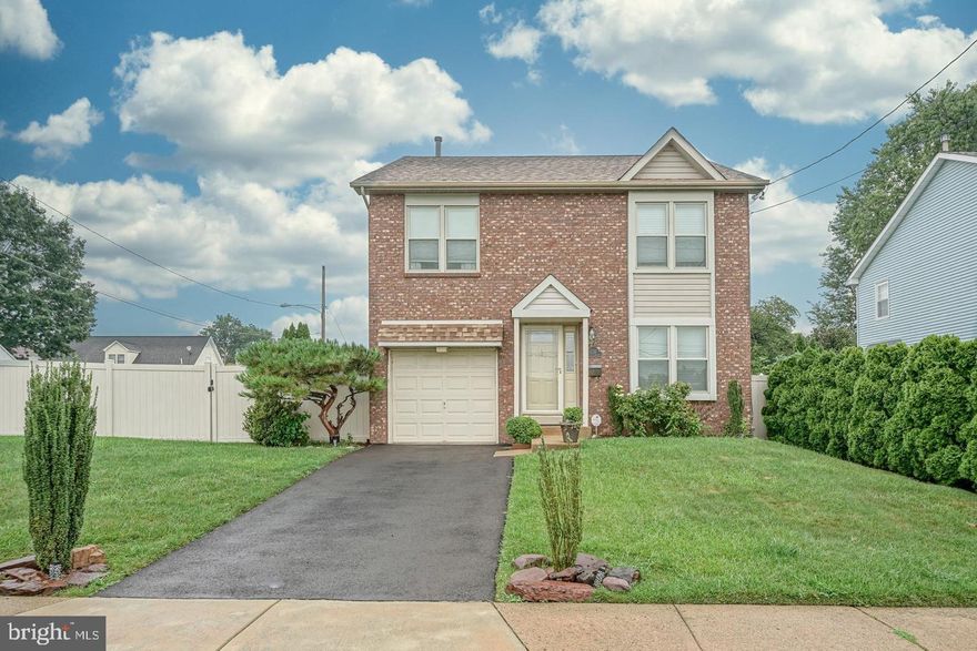 ***OPEN HOUSE: Sunday, November 2nd 12pm-2pm***  Welcome to 3701 President Street —A beautiful brick single situated on a large, corner lot in desirable West Torresdale. This charming property offers a perfect blend of comfort, space, and modern updates.  Arrive and you will immediately fall in love with the beautifully landscaped grounds. Enter to find a coat closet and quaint living room with hardwood laminate floors and hallway leading to the formal dining room with nice chandelier. Continue to find a dream, eat-in-kitchen with an abundance of white shaker cabinets & Quartz countertops with subway tiled backsplash, high-end Kitchen Aid 5-burner gas range & built-in dishwasher, built-in microwave, refrigerator with bottom freezer that is included and open concept overlooking the large family room with ceiling fan and sliding glass doors that provides access to the large, maintenance free Trex deck and huge side & rear yard that is enclosed by a maintenance free, PVC privacy fence with retractable awning. The upper level hosts a large primary suite that features a large bedroom with vaulted ceiling & ceiling fan, walk-in-closet and updated primary bathroom with stall shower, nice ceramic tiled floors, new vanity & toilet. The remainder of the upper level has 2 additional bedrooms, both with ceiling fans & large closets, as well as an updated 3-piece ceramic tile hall bathroom with ceramic tile floors, shower & soaking tub combo with beautifully tiled surround, oversized shower head & glass door enclosure, new vanity and toilet. The lower level is a fully finished basement with gas fireplace and marble shelving, a bonus room that would make a great office, exercise room or 4th bedroom, separate laundry room with washer, dryer & freezer that are included and a powder room. The front, exterior has an attached 1-car garage with electric opener and driveway that provides off-street parking for at least 2 cars. Additional features are newer roof, central air & heater, replacement windows, and the list could go on. Truly a great property that has been clearly cared & loved for. Will not disappoint.