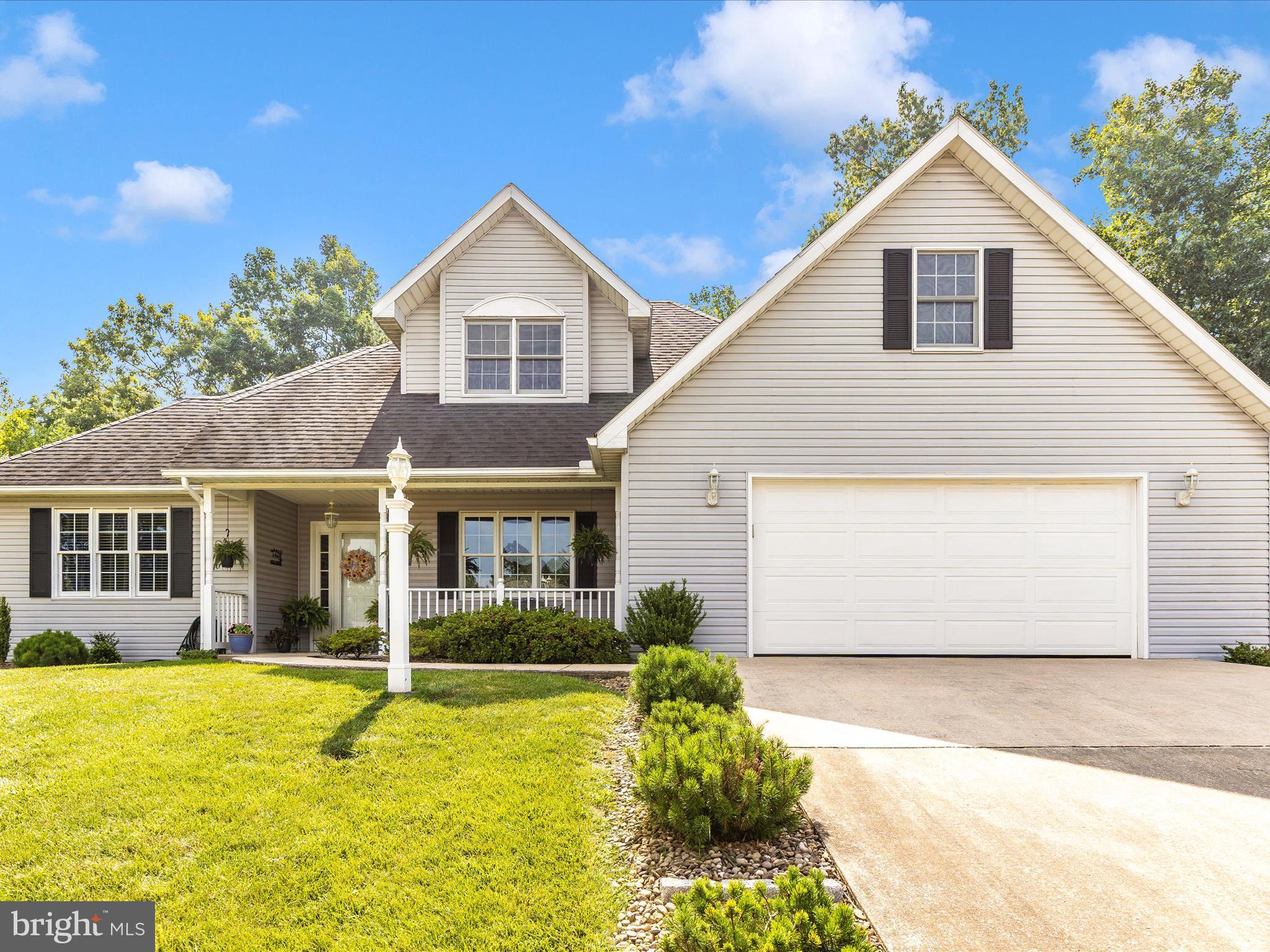 Immaculate Cape style home in the Penn National golf course community. Main level primary bedroom has a trey ceiling, hardwood floors, and large remodeled bathroom that includes tiled walk in shower, walk in closet and double vanity. The flooring has been replaced throughout the main level and includes hardwood in the living room and LVP in the dining room and kitchen area. The living room has 10’ ceilings, gas fireplace, and crown molding. A sunroom is located off the main living room and makes a great place to enjoy the wildlife in the private backyard. Kitchen features amble cabinetry, granite counters, and gas stove. There are two bedrooms and full bath upstairs with a huge additional unfinished storage space above the garage. The full basement has two access points from in the house and the garage and features a finished family room with half bath. You need to see this one!