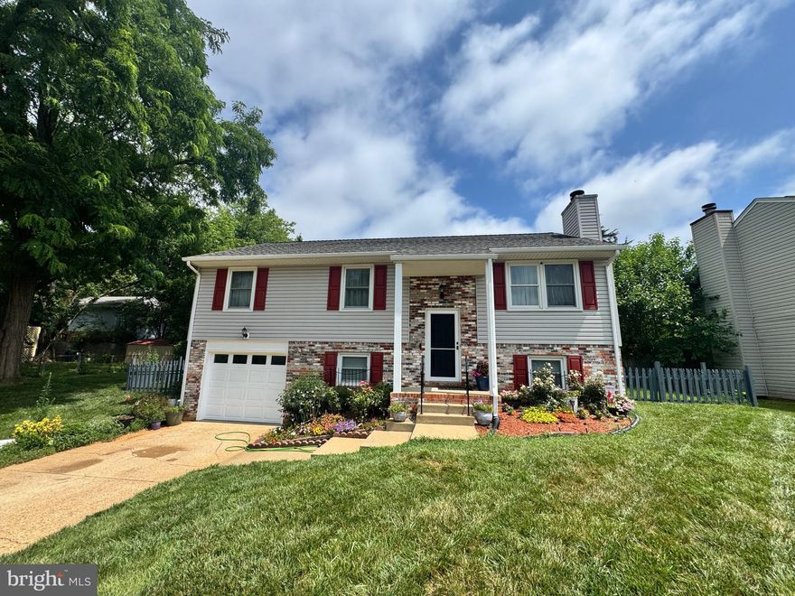 Located in the well-established Chancellor Green neighborhood, this charming 4-bedroom, 3-bath home backs to a peaceful common area for added privacy and green views. Features include a cozy living room with fireplace, a versatile lower-level family room or den, and a back deck ideal for relaxing or entertaining. One-car garage included. Enjoy the comfort of a functional layout in a quiet, convenient location close to shops, schools, and commuter routes. Don’t miss this one!