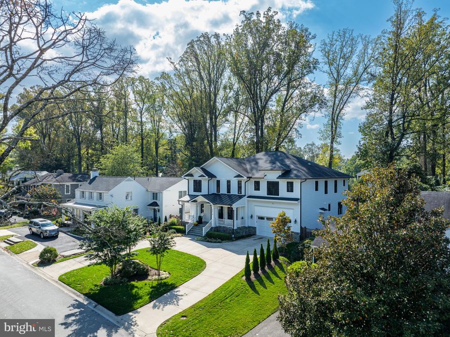 Sited on a serene, tree-lined street in Bethesda’s coveted English Village, 8014 Aberdeen Road presents a beautifully designed Craftsman, offering a seamless blend of modern luxury and timeless sophistication. Built in 2017, the residence boasts 6 Bedrooms, 6 Full Bathrooms, and 2 Half Bathrooms across 3 Levels and approximately 8,400 total square feet. The Main Level features an inviting Foyer leading to the spacious formal Living and Dining Rooms. A Gourmet Kitchen, outfitted with high-end finishes, top-of-the-line appliances, and a walk-in pantry, flows effortlessly into the sun-filled Breakfast Room and large Family Room. Adorned with tray ceilings and a gas Fireplace, the Family Room opens to a 3-Seasons Room with 11’ vaulted ceilings, and a rear Deck overlooking the fully fenced backyard. The Main Level’s thoughtful design includes a dedicated Study, a Powder Room, and a versatile Office/Bedroom with ensuite Bathroom. A mudroom provides direct access to the home’s attached 2-Car Garage. The Upper Level hosts 4 private suites, to include a luxurious Primary Suite with tray ceilings, a gas Fireplace, Sitting Room, two large walk-in closets and a spa-inspired Bath with a soaking tub, walk-in shower, dual vanity and 2 water closets. A Laundry Room and 3 additional ensuite Bedrooms, each with a designated Sitting Room and walk-in closets, ensures comfort and privacy for family and guests. An entertainer’s paradise awaits in the fully finished and multifunctional Lower Level, which includes a large Recreation Room adorned with a wet bar, a Game Room, and a Home Theater. An additional ensuite Bedroom with a Sitting Area, and convenient access to Utility and Storage Rooms complete this level’s offerings. Located in English Village, 8014 Aberdeen Rd, offers prime proximity to Bethesda’s restaurants and retail, and is zoned for Bradley Hills ES, Thomas W. Pyle MS, and Walt Whitman HS.