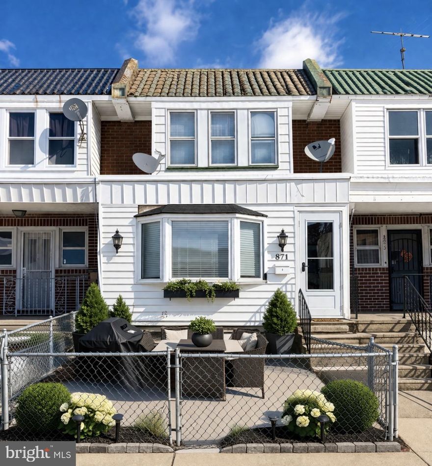 Welcome to 871 Bridge Street! This well-maintained 3-bedroom, 2- bath home is ideally located in the heart of Oxford Circle. Step inside to the spacious foyer highlighted by a bay window that fills the space with natural light. The main level offers a traditional layout featuring a generous living room and a formal dining room-perfect for everydayliving and entertaining. The eat-in kitchen provides ample cabinet space and natural light, and includes a built-in microwave, dishwasher, refrigerator, and range. Upstairs, you'll find three well-proportioned bedrooms,  a full hall bath, and hardwood flooring throughout. A (soon) finished basement with a laundry room and a full bathroom. This home also offers a one-car driveway in the rear and fenced in front yard with a patio. Being sold As-Is. A great opportunity ideal for both owner-occupants and investors seeking long-term value. A must see! Schedule your showing today.