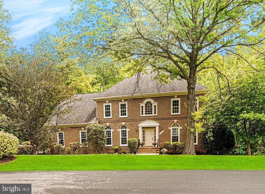 Welcome to this stunning colonial home situated in a quiet cul-de-sac, offering unparalleled privacy on a spacious 2.7-acre lot. This unique property boasts a tranquil stream and beautiful forest views, creating a serene atmosphere that is truly one-of-a-kind.

This stunning colonial home offers 5 bedrooms and 4.5 bathrooms, with a total living space of approximately 6,000 sqft.  Both levels above ground feature 9-foot ceilings and hardwood floors, creating an open and spacious atmosphere. 

Step inside to find a home that has been lovingly maintained and updated throughout the years. The house has been freshly painted in 2023, giving it a bright and modern feel. The new Energy Star windows throughout the house, installed in 2022. while the new AC unit ensures your comfort during all seasons.

The upgraded gourmet kitchen, featuring new gas-cooktop and rangehood, has plenty of storage space, perfect for preparing delicious meals and entertaining guests.

The bathrooms have been recently remodeled in 2023, giving them a fresh and modern look.  One of the bathrooms on the upper level is a Jack and Jill bathroom, shared by two bedrooms, making it perfect for families with children or guests.

The master bedroom is spacious and inviting, with ample natural light and beautiful views of the surrounding nature. A remodeled master bathroom, a sitting area and two large walk-in closets complete the master suite.

The fully finished walkout basement is another highlight of this home.  This provides plenty of natural light and easy access to the backyard.  The basement has been remodeled into a wonderful space, featuring a recreation room, home theater, playroom/gym, bedroom, and a bathroom. This space is perfect for movie nights, working out, or hosting guests.

Located in the highly sought-after Langley High School District, This home truly has it all, with a prime location and luxurious updates that will exceed all your expectations.