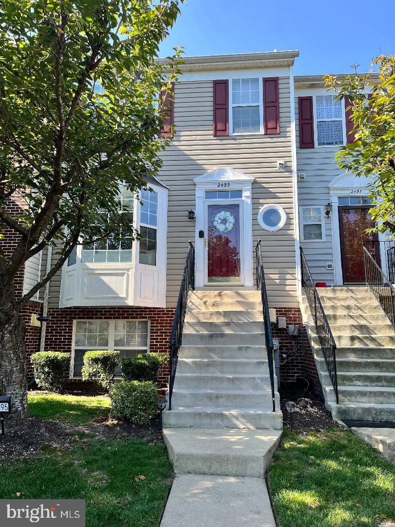 Truly a must see! Beautifully maintained interior townhome in the Wellfleet Mews Community. With easy access to Rt 301, as well as several shops and restaurants within walking distance! The open floorplan boasts hardwood flooring throughout the main level with 9' ceilings, separate dining area across from the stainless-steel kitchen with island and 42" cabinets. There's a full-sized washer and dryer in the lower-level laundry room, which gives access to the fully fenced backyard. The upper level has 3 bedrooms with newer carpet throughout, a full bathroom -all bathrooms have newer toilets as well. The owner's suite adorns a vaulted ceiling, walk-in closet, and jetted soaking tub with skylight. Let's not forget the finished walk-up attic for extra storage space!