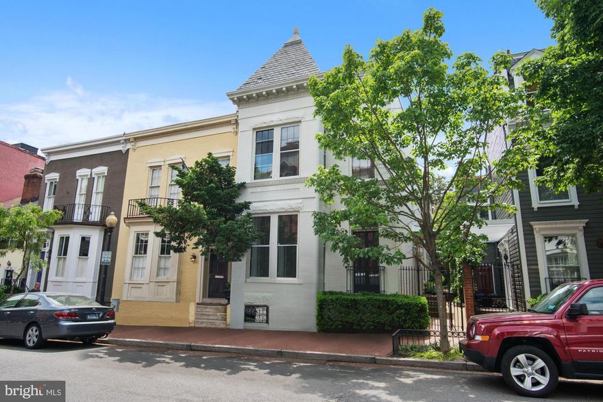 Beautiful 4BR, 3.5 BA semi-detached home with a TWO CAR GARAGE, large brick patio, newly renovated kitchen w/ attached family room and a luxurious master suite including an en suite bathroom and generous dressing room/sitting room w Washer/Dryer. Finished LL with Bedroom 4, wine cellar, laundry, and extensive storage. Other features include HWs throughout, renov baths, 3 sides of windows.