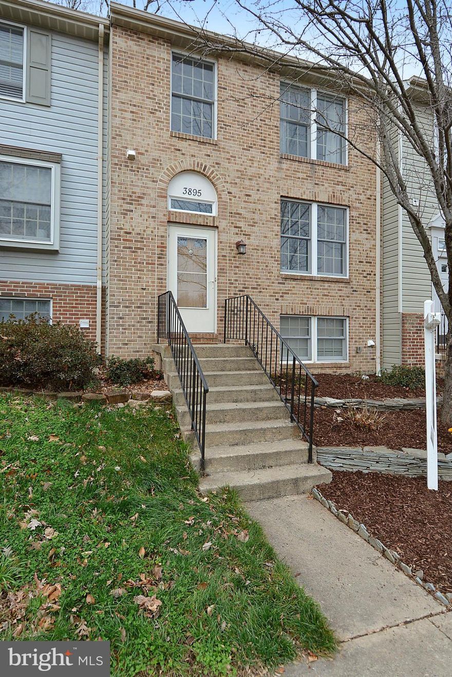 Charming Brick townhome in sought after Lake Ridge, this 3 bed, 2 full bath & 2 half bath home is situated on a circle with no thru traffic. Backing to woods, the beautifully paved back yard is perfect for outdoor living.  The open floor plan and finished basement allow for great entertaining.  Come see for yourself!   At this price it won't last long.