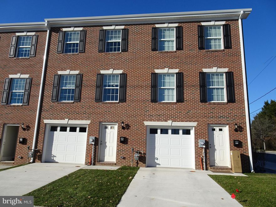 Almost like  new 3 bedroom, 3.5 bath townhome in the City of New Castle.   You will have off street parking with a driveway and garage.   The first floor has one bedroom and a full bath  with a sliding glass door that leads to a patio.  The second floor has a living room, powder room and a fully equipped kitchen, with newer appliances, and a sliding glass door that leads to a deck.  The third floor has 2 bedrooms each with their own full bathroom and the laundry area.     Pictures  may be of a similar unit, as  they are similar.