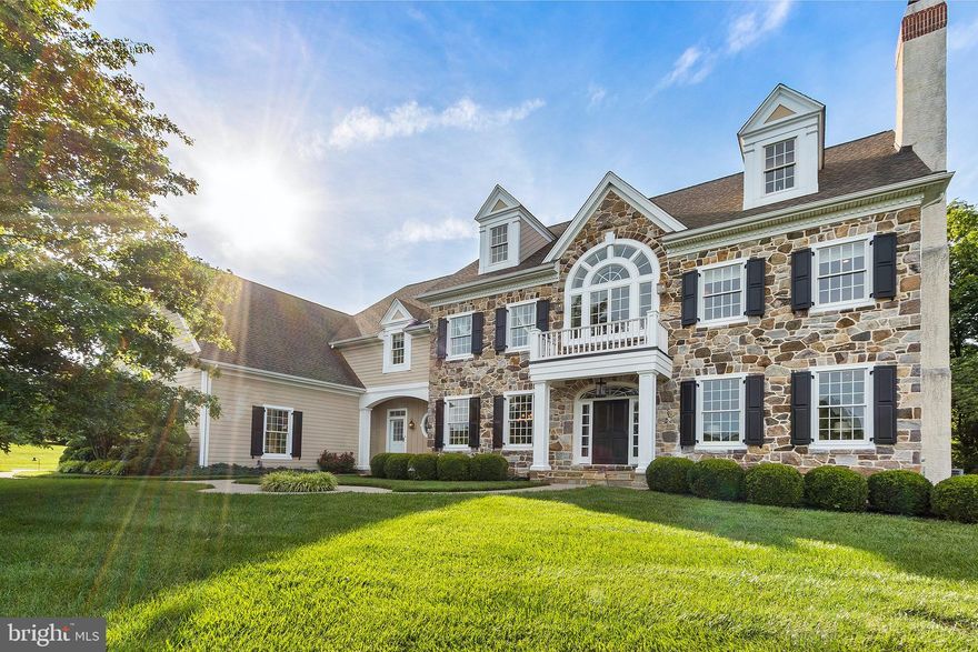 Please look for the 3D Matterport and Video walkthrough links in the virtual tours section of this listing.                  More custom touches than we can mention have been crafted into this Glenelg Farm Model home loaded with special features.  This house has it all: hardie board siding, gourmet kitchen, elegant finishes throughout, 4 bedrooms, a 5th bedroom/Bonus room/Craft room, 4 full baths, 2 powder rooms, whole house sound system, 3 car garage, glass lined conservatory, home theater and winter lighting package to name a few.  Enter into the impressive two story foyer featuring a commanding staircase with iron balusters, hardwood floors with ribbon inlay and custom wainscoting and millwork that continue throughout the first floor. To the right of the foyer opens the formal living room with fireplace that transitions through to a walk-in coat closet and powder room before entering the home office and sunny conservatory. The handsome office is punctuated with built in bookcases, grass cloth wallpaper and coffered ceilings. Through leaded pocket doors, the vaulted conservatory ceilings with french door access to the back patio with fireplace create a sunny counterpart to the study/office.  Back to the foyer, the formal dining room and gourmet kitchen are accessible to the left of the staircase and connected by a well-appointed butler s pantry with wine fridge and prep sink. Professional kitchen upgrades include Dacor appliance suite with sub zero refrigerator, farmhouse sink and under and over cabinet lighting.  Plentiful storage and cabinet space can also be found in the center island which offers additional seating.  Family room with a wood burning fireplace and Breakfast room have 8 foot windows with a surplus of natural light.  Completing this level is a mud room entrance with boot bench, powder room, built-in desk, garage access and nook space intended for an elevator initially but can now be used in any way.  Upstairs is a massive master suite that almost acts as a separate apartment and includes a fireplace sitting room complete with coffee prep area.  Huge Double walk-in closets are outfitted with custom organizers.  Attention to detail was followed in the ensuite bathroom with decorative vanity nooks, glass shower with bench, soaking tub and water closet.  Three additional large bedrooms are found on this level - a princess suite with bathroom that also opens to the hall and a Jack and Jill bathroom between the other two bedrooms.  On the second floor landing by the back stairs is a built in desk area, a large laundry room with sink and worktop counters and a huge bonus room with french doors that let in fresh air.  Walk up to attic storage or down to the finished lower level by way of the back staircase.  Basement is expansive with a sunny walk-out family room, home theater, wet bar kitchenette with seating, separate private home gym, full bathroom and wine tasting nook.  Great outdoor space can alternate between the beautiful manicured lawns, the basketball friendly driveway and the hardscape fireplace patio in back.  Three car garage is oversized to accommodate cars and storage.  Located in top Unionville-Chadds Ford school district and close to Kennett Square shops, downtown restaurants and Longwood Gardens.