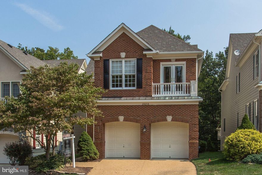 PRICED $10,000 BELOW TAX ASSESSMENT! Come see this upscale property on one of the most sought after streets in Loudoun County -  overlooking the prestigious Nat'l Golf Course and the Potomac River!!   All 3 levels total close to 5000 sq. ft. of elegant design. Soaring ceiling above curved stairway! NEW hardwood floors.  NEW 5 burner cook top and hood, SS and granite. Romantic double sided fireplace in Master Bedroom and bath.  Relax in your Master with a view of the river - wine time!  Three full baths upstairs with 4 Bedrooms. Full bath in walk-out lower level plus large second Family Room and separate amazing Media Room.  Private Golf Carts permitted. Lawn maintenance included! Lots of WOW factor in a DREAM location!