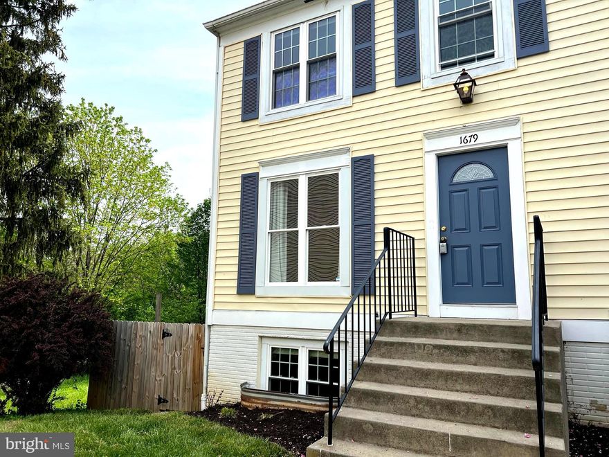 Beautifully updated end unit townhouse. 4 Bed/2 Full Bath. New carpet, laminate flooring, paint. Shades/blinds in each bedroom. New fridge and dishwasher. Updated deck with fenced yard that backs to woods. 2 Ethernet drops and cable hookup in each bedroom, main living room and basement living room. Includes 2 assigned parking spaces. Rent included water and HOA.