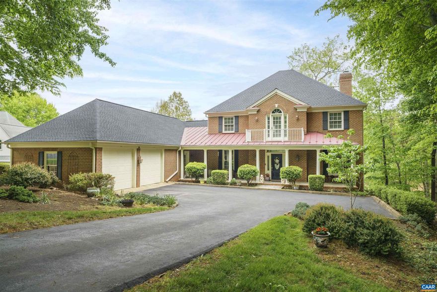 Extraordinary Glenmore waterfront residence with sweeping pond, fountain, and 7th tee views, ideally located on a private cul-de-sac. Enjoy resort-style living with golf, clubhouse, dining, pools, tennis, fitness center, and walking trails. This all-brick Georgian home offers over 5,000 finished sq. ft. and nearly $200,000 in recent upgrades, including roof, decks, HVAC, whole-house generator, window coverings, lighting, water heater, toilets, and gutter screens. Designed for main-level living, it features two primary suites, including one on the first floor, plus three additional bedrooms and 3.5 baths.   Highlights include a gourmet granite kitchen, loft/study with panoramic views, finished walkout terrace level, two wood-burning masonry fireplaces, Low-E vinyl-clad windows, 2x6 construction, maple flooring, and custom glass-front maple cabinetry.   Outdoor spaces include gracious columned front and rear porches, charming courtyard entrance, and three decks?one covered and one screened?perfectly positioned to capture stunning water, golf, and landscaped views. A rare Glenmore offering that shows like a model home.,Glass Front Cabinets,Granite Counter,Wood Cabinets,Fireplace in Basement,Fireplace in Living Room