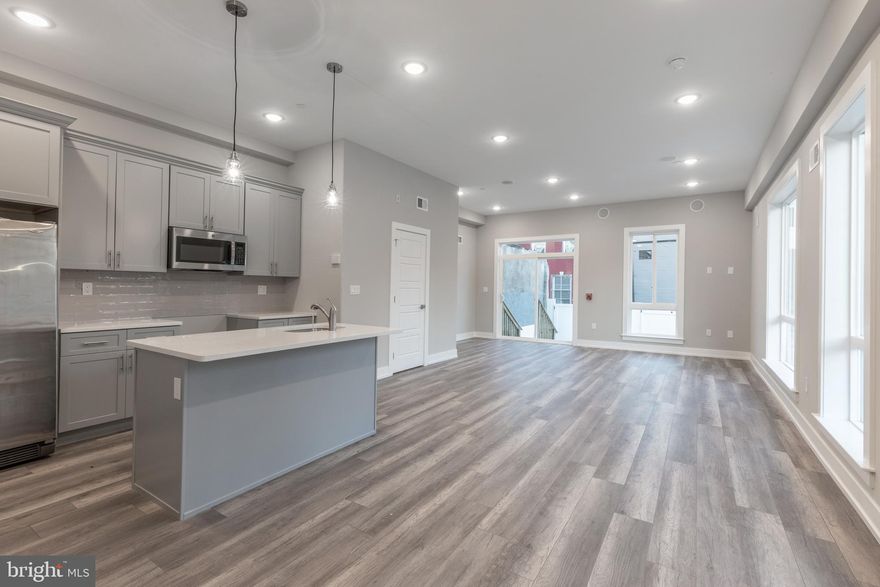 Welcome to 2401 N Mascher St (Unit #2). This beauty has the most spacious open floor plan you will see. This spacious unit features 2 bed 2.5 bath bilevel unit.! Plenty of storage and closet space throughout. Unit includes in-unit washer/dryer, open concept living/kitchen, stainless steel appliances and kitchen island with quartz countertops. It comes with all the extras as well, from surround sound built in speaker system, to smart thermostat and security system. What a great block to live on with new construction all up and down the block. Over 300+ new construction units either completed or currently under construction within a 3 block radius. Public transportation and the EL station is a few blocks walk and the Waterloo park is close by and has been fully renovated.  Come see for yourself! Call for more info.