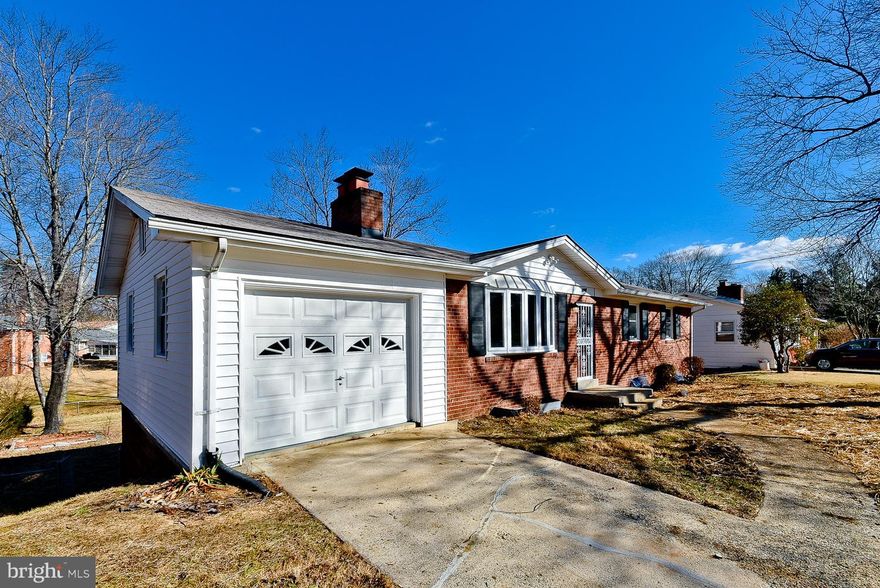 Move in ready.  Updated bathrooms. Hardwood floors on the main level.  Two fireplaces.  Mater bedroom with separate bathroom.Walkout basement. Large backyard for Family cookouts!  Attached 1 car garage!  Must see.  CSS for combo.  Owner/Agent.