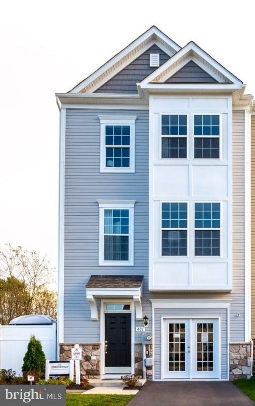 Gorgeous Model Home for sale! This 3 level, 3 bedroom/3.5 bath home features all the bells and whistles including a 1 car garage, partial stone, finished basement and security system. It was the model home in the very sought after amenity packed Martinsburg Station community. End unit with a private back yard that can be enjoyed while sitting on the composite deck in the mornings/evenings off of the 12' morning room. The kitchen features beautiful slate cabinets, quartz countertop and large 8ft kitchen island with a breakfast nook. Custom craftsman style trim work in specific rooms along with upgraded trim throughout. The large master bedroom features a tray ceiling, walk in closet with an en suite that includes a deep soaking tub /separate walk in shower, quartz vanity and upgraded tile. Bedrooms 2 and 3 also include vaulted ceilings with one having a bay style window. Too many upgrades to list. Must see to appreciate. Martinsburg Station offers full amenities such as a pool, club house, tennis courts, ponds, walking trails, playground and sidewalks/streetlights.