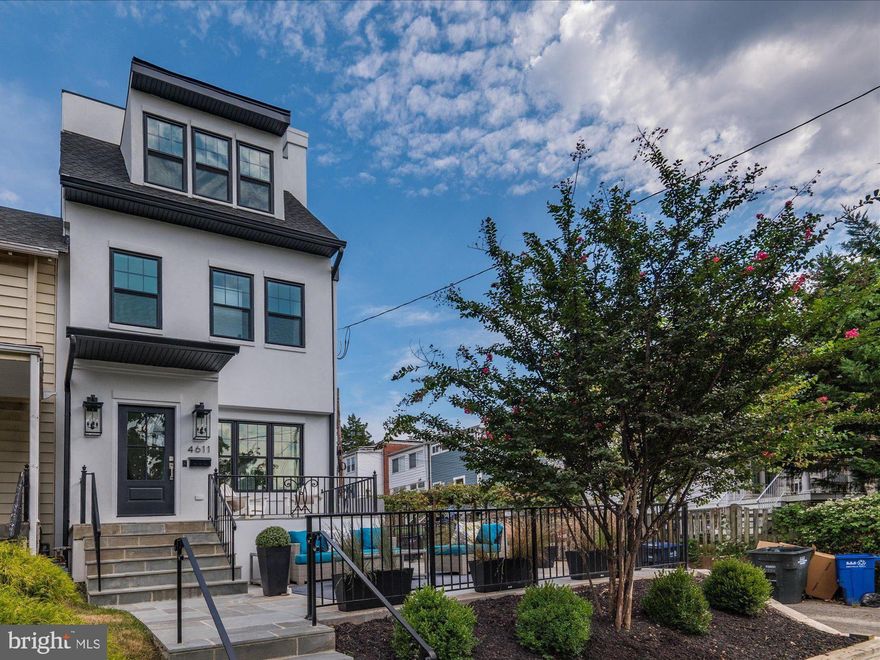 Everything you've been waiting for in AU Park!

Welcome to 4611 43rd Street, NW, a stunning elevator home in the heart of American University Park and just two blocks from the Tenleytown Metro. Meticulously rebuilt from the ground up in 2023, this 5BR/5.5 BA semi-detached masterpiece combines classic elegance with a modern edge to bring you five levels (all accessed by elevator!) of stylish and graceful living and entertaining spaces.

The main level of this "smart home" features a formal living room, separate dining area, over-the-top gourmet kitchen (Bertazzoni stove!), and expansive family room opening to a rear patio and backyard. The 10' ceilings and south-facing wall of windows create an extraordinary feeling of openness and warmth. The main level also includes an entry closet, powder room, and walk-in pantry.

Upstairs, accessed by a wide white oak staircase or by elevator, includes two levels of sleeping quarters -- the first is home to the primary suite complete with two closets (one is room-sized!) and a deluxe bath with oversized shower, a second bedroom with ensuite bath, and a supplemental laundry closet. One floor up are two additional bedrooms and baths -- plus access to a stunning outdoor living room/deck overlooking the backyard with views of the gorgeous magnolia tree.

This expansive rear upper deck has a spiral staircase leading to an additional 665 sqft roof deck with views for days! This area has roughed-in plumbing, electrical, and gas for grilling and is accessible via elevator as well.

The lower level has 10' ceilings, great natural light, and runs the entire footprint of the home. It includes a bedroom with two closets, a full bath, separate laundry room with sink, and a huge flex space with a wet-bar at one end and a separate mirrored gym at the other.

There is a two-level terrace at the front of the home and an oversized detached garage at the rear. Inside the garage is pull-down access to a 382 sqft loft (perfect for storage, or a possible future conversion to an ADU!). With a Walk Score of 91, the whole world is at your door! So close to Janney Elementary School, Whole Foods Market, the Tenley Library, the new Wegman's, and all the many amenities of the Wisconsin Avenue corridor.  Welcome home! 

Please see our special features list for many more details about this very special home!