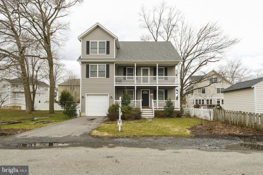 Open Sat AND Sun 1-3. Recently built gorgeous waterview home in water privileged Woodland Beach.  Great layout features five large bedrooms including a huge master suite with walkin closet and deluxe bath.  Gleaming hardwood floors on main level with beautiful gas fireplace in family room. This house is just steps away from neighborhood beach and neighborhood pier!