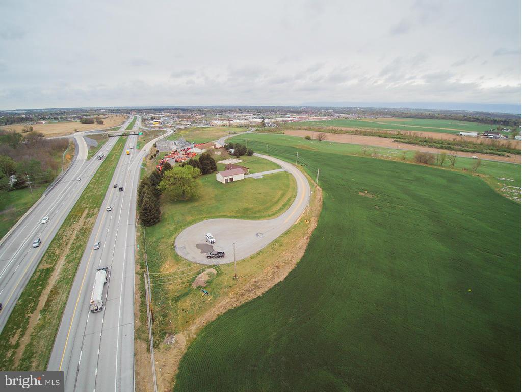 TRAFFIC LIGHT APPROVED BY PENN DOT FOR INTERSECTION OF KOHLER AND WALKER! WATER AND SEWER SERVICING AGREEMENT IN PLACE!!!The opportunities are endless with this zoned commercial land off Walker Rd I-81 Exit! 70 +/- acres of Transitional Commercial land with 13+/- acres or Interchange Overlay District. This new zoning allows for convenient stores/Retail/Medical/Restaurants/Gas Stations/Etc.! This is an extension of an already prime commercial area. Great I-81 exposure!