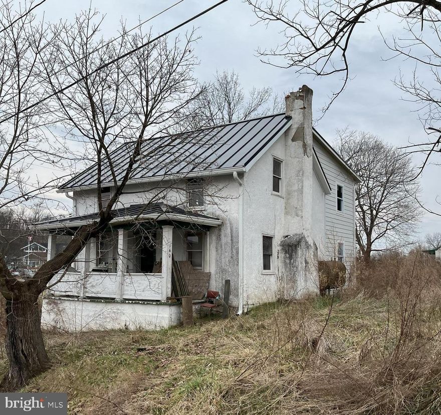 Beautiful views in Harpers Ferry on a .25 acre corner lot on a one way street.  This home being sold AS IS but has a lot of potential. New metal roof, new windows, etc.. Finish it off how you want it.  Must see!! Cash or Construction loan only.