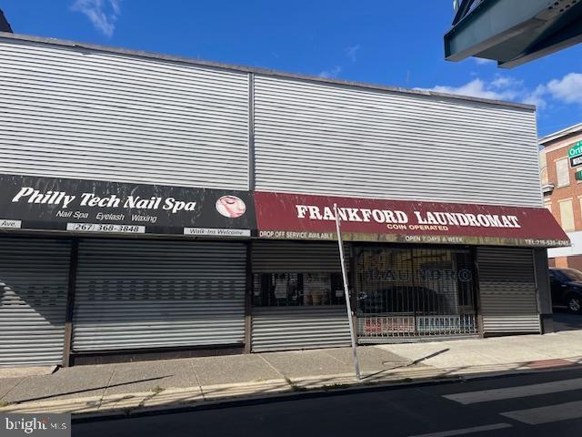 BIG PRICE DROP!!
TWO very large, cleaned out SEPARATE commercial properties. Side to side. One was used as a nail salon the other has been used and is equipped with laundry machines.
Large basement. Many rooms including kitchen area and office area.
The central AC has been updated as well as the roof. Security gates at entry for both.
Both units are now cleared out. Property is vacant and ready for easy showing and immediate possession.