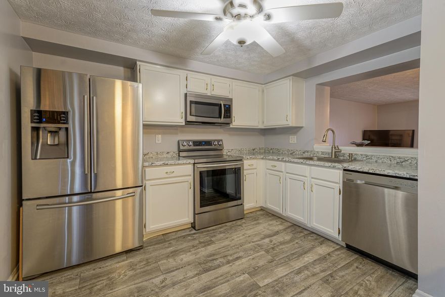 Pride of ownership seen the moment you walk up to the quaint front porch and enter the front door!  This meticulously maintained home  in Upton Village North offers 3 bedrooms, 2 full baths and many updates to include: Thompson Creek Front Door/Storm Door in 2018, Thompson Creek Windows and rear slider, 2014 both with a Limited Lifetime Transferrable Warranty,  New Carpet, Fresh Paint & New Kitchen & SS appliances in 2020, Water Heater in 2015 & HVAC in 2018.  Lower Level Family/Rec Room w/ full bath, laundry.  Large maintenance free Trex decking and concrete patio for those outdoor BBQ's.