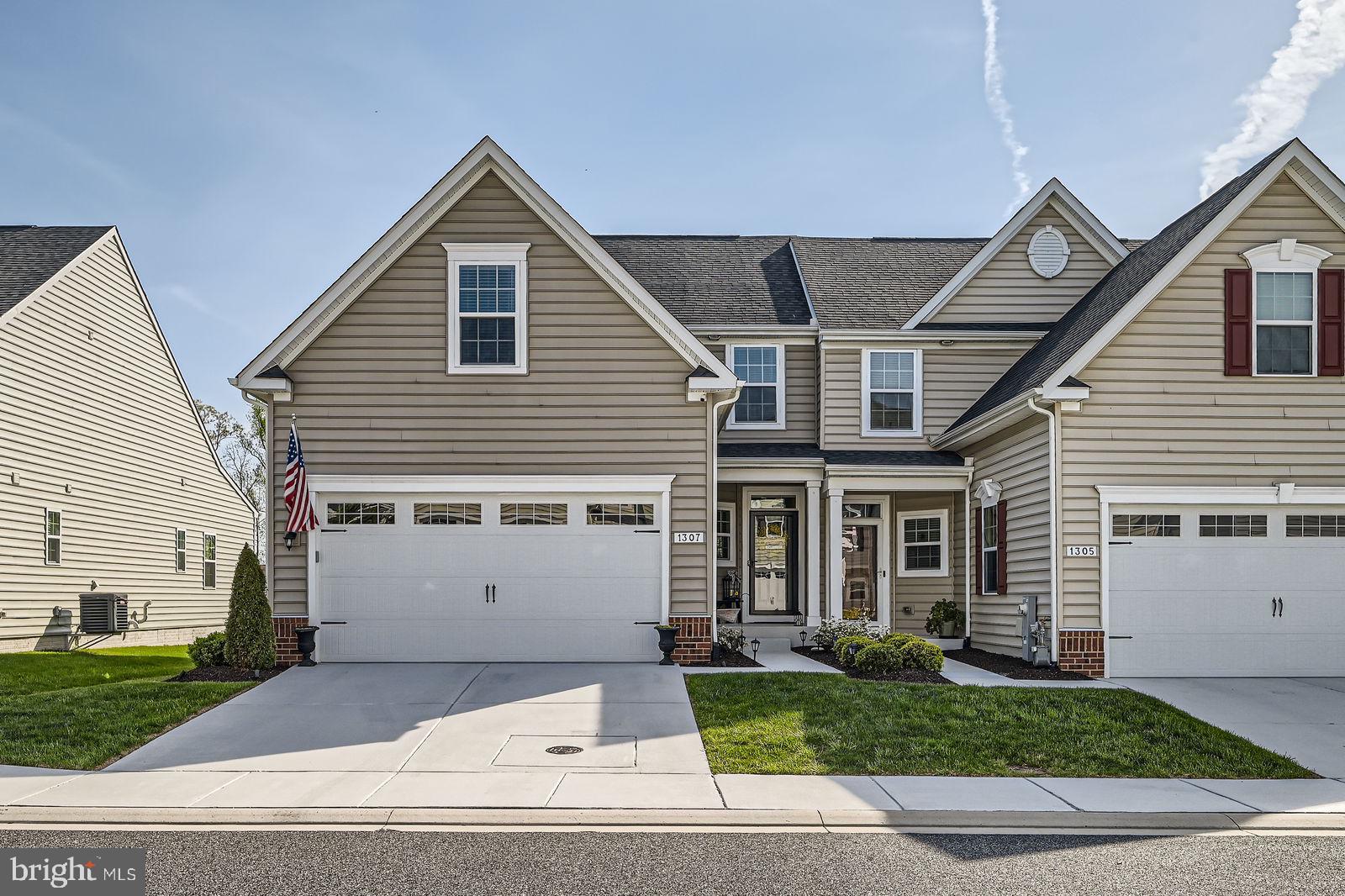 Welcome to this beautifully upgraded, end-of-group villa located in one of the area's most desirable 55+ communities. Only 5 years young and impeccably maintained, this home offers the perfect blend of high-end finishes, thoughtful upgrades, and a vibrant community lifestyle. Inside, you'll find 3 spacious bedrooms, 3.5 bathrooms, and a flexible open-concept layout with designer touches throughout—crown molding in the kitchen, main living area, and primary suite, barn door entry to the main-level half bath, and integrated surround sound speakers for the ultimate comfort and entertainment. The chef’s kitchen is a showstopper, featuring granite countertops, top-of-the-line appliances, and an upgraded design perfect for cooking or gathering with friends. Enjoy main-level living with a primary suite and laundry on the first floor, plus an extended sitting room that opens to a 20-foot deck with a retractable awning—perfect for summer evenings and watching 4th of July fireworks without ever leaving home. Grill enthusiasts will love the Quick-Connect gas line on the deck and an additional hookup for future use. The fully finished basement adds even more versatility with a large family/TV room, space for a gym or office, and a massive storage room with built-in shelving. Tech-savvy homeowners will appreciate the two-zoned HVAC system with automatic mechanical dampers, humidifier, and WiFi-enabled Nest thermostats. Outside, enjoy beautifully maintained grounds enhanced by additional landscaping lights. And the best part? The HOA takes care of the lawn maintenance and treatments, power washing, snow removal, trash pickup—and gives you access to the clubhouse, inground pool, and a full calendar of social events, trips, and activities.
This is more than a home—it's a lifestyle. Easy access to shopping, dining, and everyday essentials makes this location as convenient as it is charming. Don't miss your chance to live in this thriving 55+ community where neighbors become friends and every day feels like a getaway.