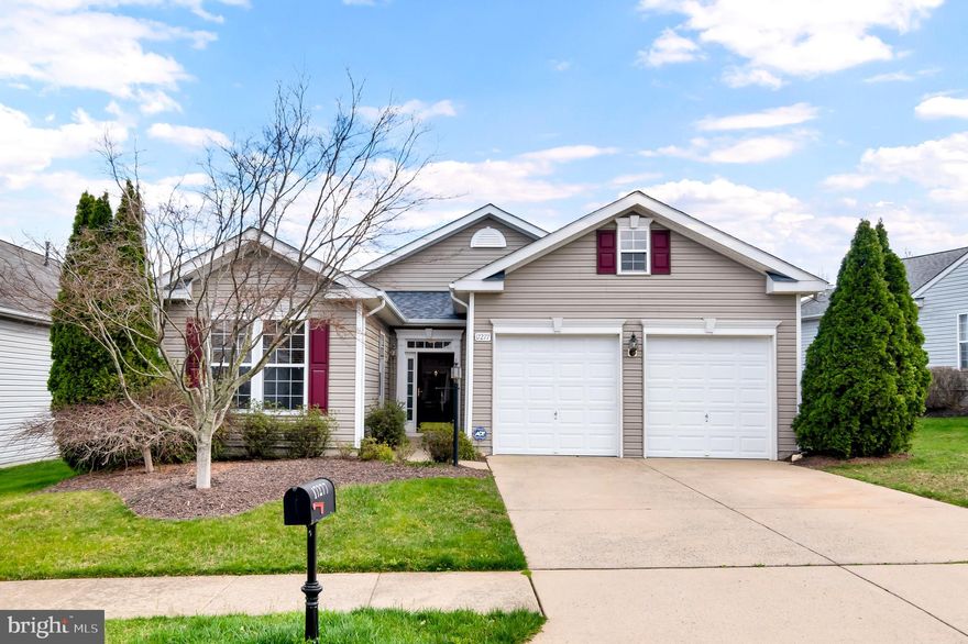 Welcome to 17277 Four Seasons Drive in vibrant Dumfries, Virginia! Nestled on a quiet street in the premier gated adult community of Four Seasons, this lovely home offers plenty of space for living on one level. 

Featuring a well-designed floor plan offering convenient one-level living, this home also presents the opportunity to expand with additional square footage by finishing the attic space.

Upon entering, hardwood floors in the foyer welcome you home as you ease into the light-filled living room where 2-story high ceilings with plenty of windows and a stone fireplace serves as the focal point of the room. 

The  spacious kitchen is sure to inspire the sophisticated chef with dark cherry cabinetry, decorative backsplash, and gourmet appliances with cooktop and double wall oven. Enjoy morning coffee in the breakfast area, sitting fireside in the family room, or in the adjoining sunroom that opens to the patio and common green space beyond—seamlessly blending indoor and outdoor dining, entertaining, and simple relaxation.

The gracious primary suite features soaring cathedral ceiling with ceiling fan, a walk-in closet and secondary closet, a luxurious ensuite bath with dual vanities, Jacuzzi tub, glass-enclosed shower, and spa-toned flooring and surround. Down the hall, two additional large bedrooms, each with ceiling fans and generous closet space, enjoy easy access to the hall bath with tub/shower combo. 

A laundry room/mudroom with additional storage and your entryway to garage. The 2 car garage has plenty of storage and additional storage loft accessible by staircase above the garage complete the comfort and luxury of this wonderful home. 

All this can be found in a vibrant 55+ community where leisure and recreation are the cornerstones delivering such amenities as an indoor and outdoor pool, putting green, tennis courts, nature trails, lake, fitness center, and a community center with daily scheduled activities—there’s something here for everyone!

Enjoy the diverse shopping, dining, and entertainment choices available throughout the area and Fortuna Center Plaza puts all the daily necessity shops right at your fingertips. Outdoor enthusiasts will love nearby Prince William Forest Park bestowing 15,000 acres of woods, streams, and fragile ecosystems sure to excite the nature lover.
If you’re looking for enduring quality built with fine craftsmanship and sprinkled with designer flair, then you have found it. Welcome home! 
Notable Improvements: Roof, 2022 | HVAC, 2019 | Water Heater, 2021 | Washer, 2023 | Hardwood Floors, 2019-2020 | Rain Bird Irrigation System winterized November, 2023.