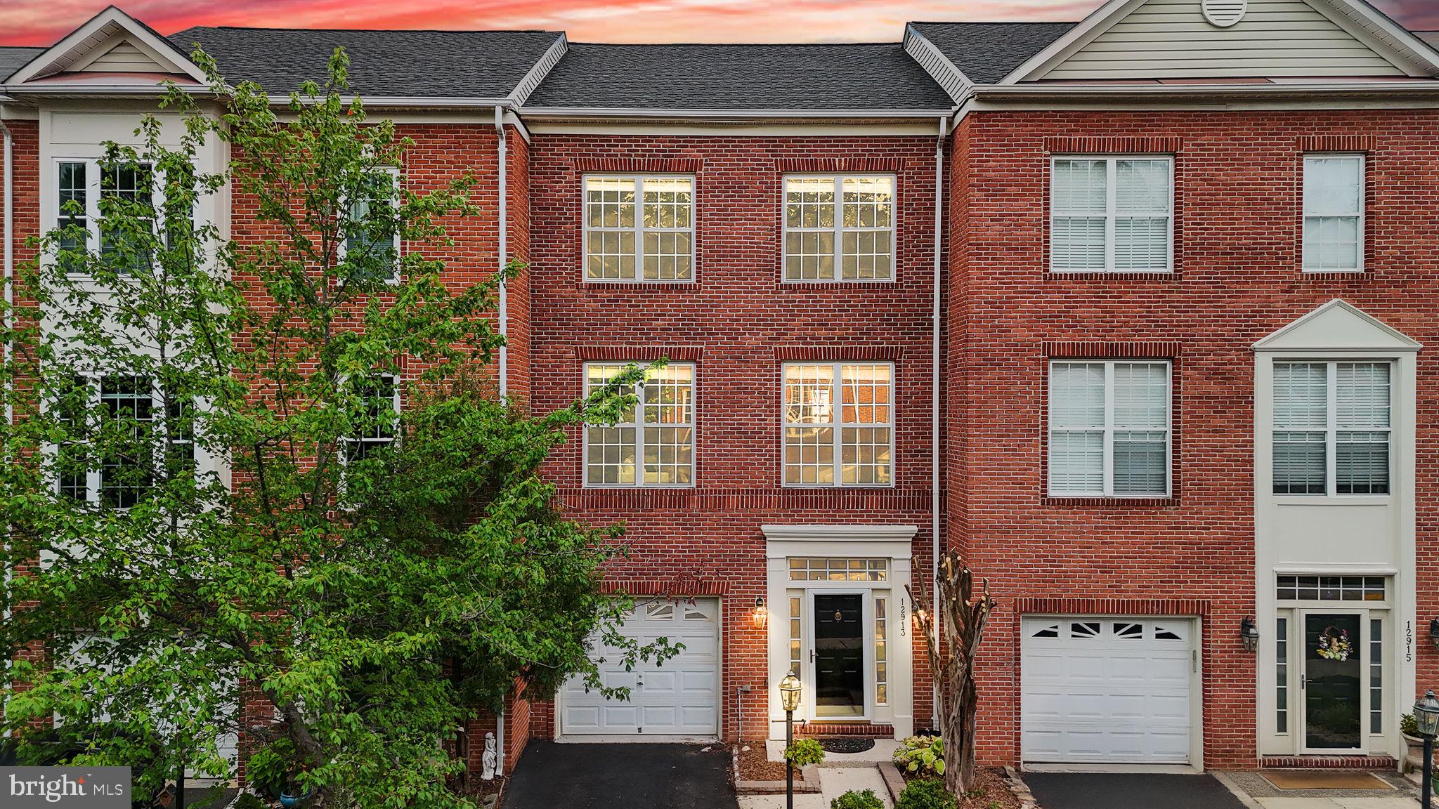 Open House Saturday 12-2pm and Sunday 2-4pm!
Welcome Home! This expansive 3-level townhome offers over 2,700 finished square feet of living space with 4 bedrooms, 3.5 baths, and a 1-car garage. Freshly painted and move-in ready, it delivers a perfect blend of luxury living and urban convenience.
The entry level features brand-new LVP flooring, a cozy fireplace, and a private bedroom with a modern full bath, plus walkout access to a flagstone patio.
The main level showcases a true showstopper kitchen with white cabinetry, quartz countertops, stainless steel appliances, and a generous island that flows seamlessly into the open dining and living areas. A spacious deck extends the entertaining space outdoors.
Upstairs, the primary suite is a luxurious retreat with vaulted ceilings, two walk-in closets, and a spa-inspired bath with a free-standing shower, soaking tub, and private water closet. Two additional bedrooms, a full bath, and an upper-level laundry room complete the top floor.
Perfectly located just 0.7 miles to the Herndon Metro and steps to Harris Teeter, shops, and dining, with effortless access to Route 28, 267, Fairfax County Parkway, Reston Town Center, and Dulles Airport. Make this home yours today!