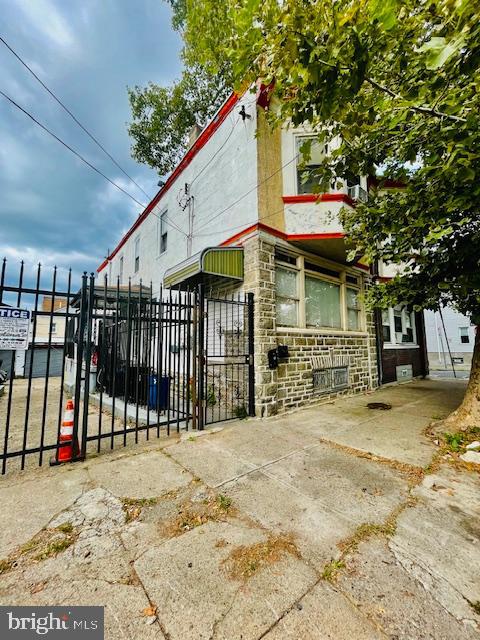 This charming twin home in the desirable Olney neighborhood offers a unique investment opportunity with significant potential for returns. Built in 1935, this property boasts a solid masonry construction, ensuring durability and low maintenance costs. With three spacious bedrooms and two full bathrooms, this home is designed for comfort and functionality. The 0.1-acre lot provides ample outdoor space, ideal for landscaping enhancements or potential expansions, increasing property value. Parking is a breeze with both driveway and off-site options available. Investors will appreciate the strategic location, which promises steady demand in the rental market. The absence of a pool reduces maintenance costs, while the classic architectural style appeals to a broad range of tenants. Seize this opportunity to enhance your portfolio with a property that combines charm, functionality, and investment potential!