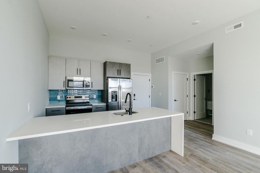 *Available 9/1/2024*

Welcome to The Washington, a newer 72-unit apartment building situated just a short distance from Temple University, Temple University Hospital, shops and restaurants along North Broad Street, as well as the exciting East Kensington and Olde Richmond neighborhoods. The building features a limited number of garage parking spaces available to rent for $100/mo, a co-working/lounge space with a cozy fireplace and bluetooth speakers, a studio/gym area for mat-based workouts, a bike room, a mail/package room inclusive of an Amazon Hub Locker, and a shared roof deck with great city views. This apartment boasts a spacious 720 sq ft 1 bed, 1 bath layout that comes with laundry, central AC, contemporary finishes, as well as its own designated storage closet. The kitchen is appointed with brand new stainless steel appliances that include a dishwasher, garbage disposal, microwave, and electric range. The bedroom is comfortably sized with great closet space and natural light thanks to many windows, while the bathroom features modern fixtures and a tub/shower. This new apartment community truly leaves nothing to be desired and offers an excellent living experience in a rapidly developing part of the city. See this exciting space for yourself and book your tour today!

*$500 pet fee per pet, 2 pet max.
*Photos of a similar unit in the building. Finishes may vary.

Please call to schedule an appointment for a showing!