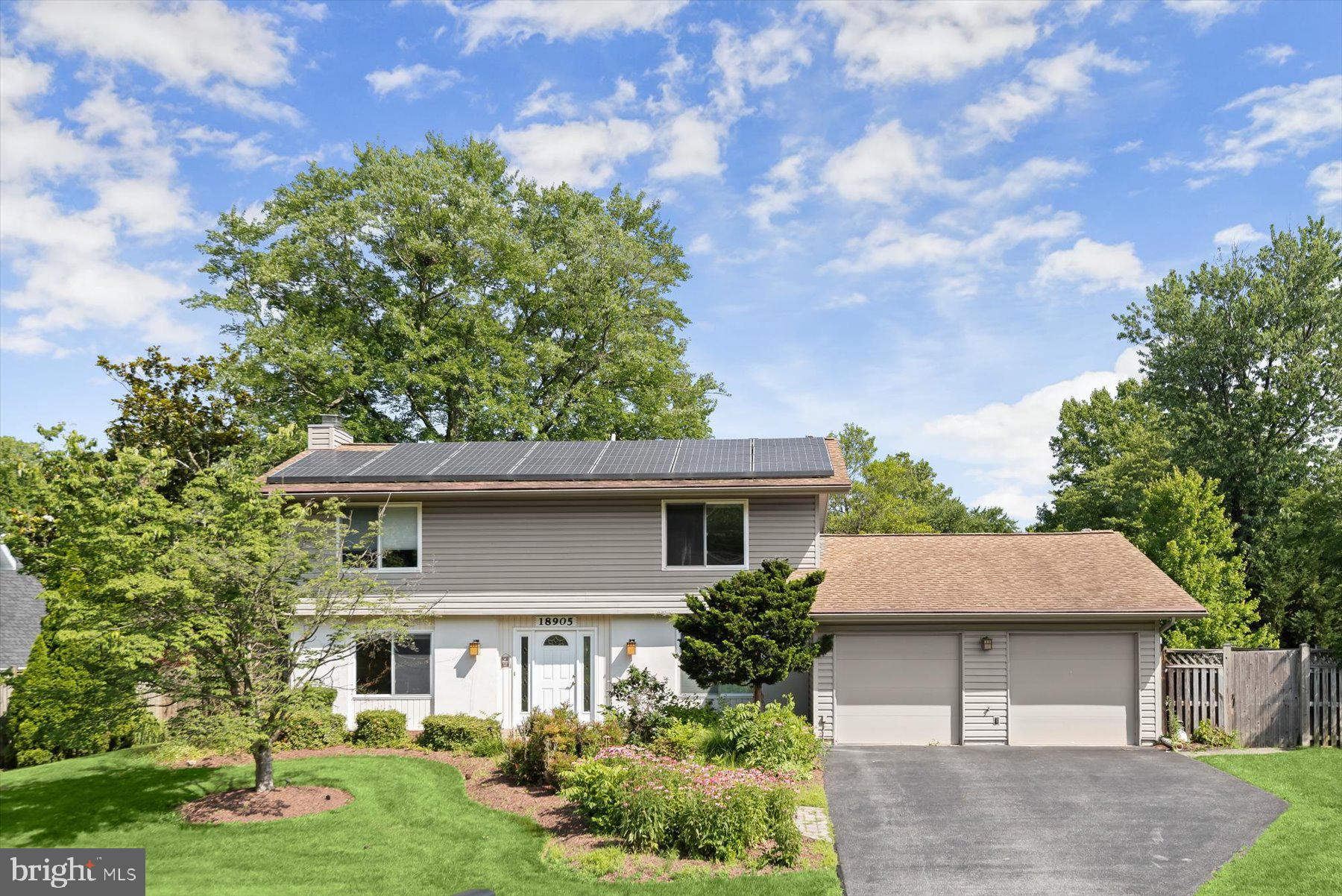 Welcome to 18905 Heritage Hills Drive, a bright and welcoming 4 bedroom, 2.5 bathroom home located in the heart of the Brookeville Knolls community. With over 2,000 square feet of living space spread across two thoughtfully designed levels, this home offers both comfort and character. Natural light fills each room, highlighting the rich hardwood floors and creating a warm, inviting ambiance throughout. Step outside to enjoy a beautifully manicured and fully fenced backyard, complete with a stone hardscaped patio and a spacious shed for additional storage. Whether you're enjoying a quiet morning or gathering with friends, the outdoor space offers a peaceful setting that feels like home. Modern updates bring added value, including solar panels under a transferable lease with 10 years remaining for long-term energy savings, and a Lennox HVAC system installed in 2020 to keep things comfortable year-round. The two car garage adds practicality to daily living. Residents of Brookeville Knolls enjoy access to the sought-after Tanterra Pool, as well as nearby parks and trails that make it easy to stay active and connected with nature. Just a short drive away, the Olney Shopping Center offers dining, retail, and essentials, while local favorites like Brookeville Beer Farm and other nearby breweries provide laid-back destinations to unwind. With close proximity to the ICC and a community known for its strong schools, cultural offerings like the Olney Theatre, and local institutions such as the Olney Library, this location combines daily ease with lasting appeal. 18905 Heritage Hills Drive is more than a place to live. It is an opportunity to settle into a home and community that offers space, charm, and convenience all in one.