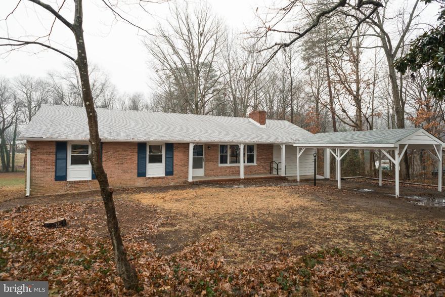 Charming Brick Rambler located in Stafford County. Just over 1 mile from Leeland Station. This newly renovated, 3 bedroom home is complete with granite counter tops, stainless steel appliances, hardwood floors throughout, and a cozy wood burning stone fireplace. Large rec room with private access to the large backyard. Great home...great location! Ready for it's new family!!