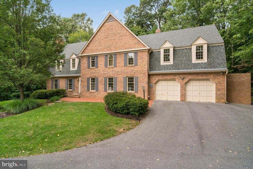 Reduced $ Value in this Classic All Brick Colonial.FreshlyPainted! HWds flow into over sized formal dining room w/ fireplace.Kitchen features Italian Tuscany flair with granite, 2 full size sinks,breakfast bar,open floor plan encompass grand family room.All season porch over looks generous waterfall and lush landscaping.Over 4,000 sq.ft.+ full sized lower level.Water privileges on the Severn River