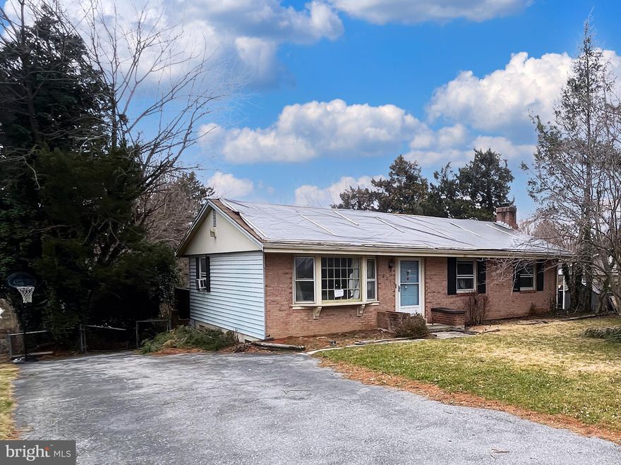 ONLINE AUCTION: Bidding begins 04/02/2025 @ 10:00 AM. Bidding ends 04/04/2025 @ 11:200 AM. List Price is Suggested Opening Bid. Deposit: $35,000.10% buyer’s premium will be added to High bid. ATTENTION INVESTORS! You won’t want to miss this rare opportunity in Frederick County!
Embrace the Smalltown Feel with this Charming single story Rancher is Located in the Manchester Village neighborhood. Convenient to everything you could ever need! Including Shopping, Schools, Parks and the numerous attractions of Catoctin Creek Park & Nature Center. As an added bonus- ONLY +/- 14 minutes to the MANY attractions of Harpers Ferry, WV. With a private driveway and sprawling backyard; This Gem is Ready for you to Make it your Own!  Easy access to Major Traffic Artery, MD Route 340. Property is vacant.