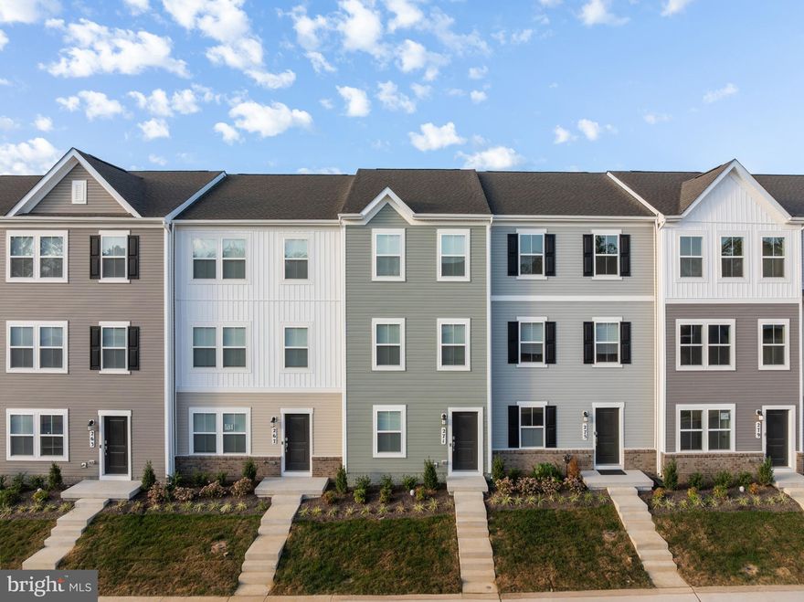 ***Open House -- Thursday, October 16th from 5:00-7:00pm*** Move right in to this brand-new Quincy floor plan townhome in Shenandoah Springs, offering 3 bedrooms, 3.5 baths, and three thoughtfully finished levels. The entry level includes a private bedroom with full bath and access to the rear-load garage, while the main level features 9’ ceilings, durable vinyl plank flooring, and an open-concept design connecting the great room, dining area, and modern kitchen with White Ornamental granite countertops, Barnett Duraform Linen cabinetry, and stainless steel appliances. A half bath and 10x12 composite deck complete the main level, perfect for entertaining or relaxing. Upstairs, you’ll find two bedrooms, including a spacious owner’s suite with walk-in closet and spa-like bath, plus a full bath and laundry area with washer and dryer included. Community amenities include a tot lot, basketball court, and walking paths, with convenient access to Northern Virginia, Baltimore, and Washington, D.C. This move-in-ready home is waiting for its first residents—schedule a tour today!