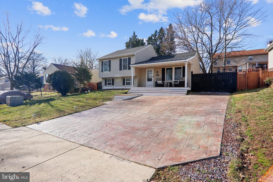 This property is an absolutely beautiful, well-maintained split level home complete with 4 bedrooms and 3 full baths. While three of the bedrooms are located upstairs, the other is on the lower level- the perfect space for an office or guest room. Gourmet Kitchen w Granite & Stainless, Finished Basement, Hardwoods, and Exquisite Tile. With its welcoming front porch made from track wood for low maintenance, large deck, stone patio, driveway, and spacious yard surrounded by a privacy fence, the exterior of the home is the definition of stylish practicality. Coupled with its metro accessibility and the fact that the HVAC system and all of the major appliances are 6 years old or younger, this house is an absolute steal. Nothing to be done but to unpack and move in. Welcome, Home! Time to head out to the patio to kick back and relax.