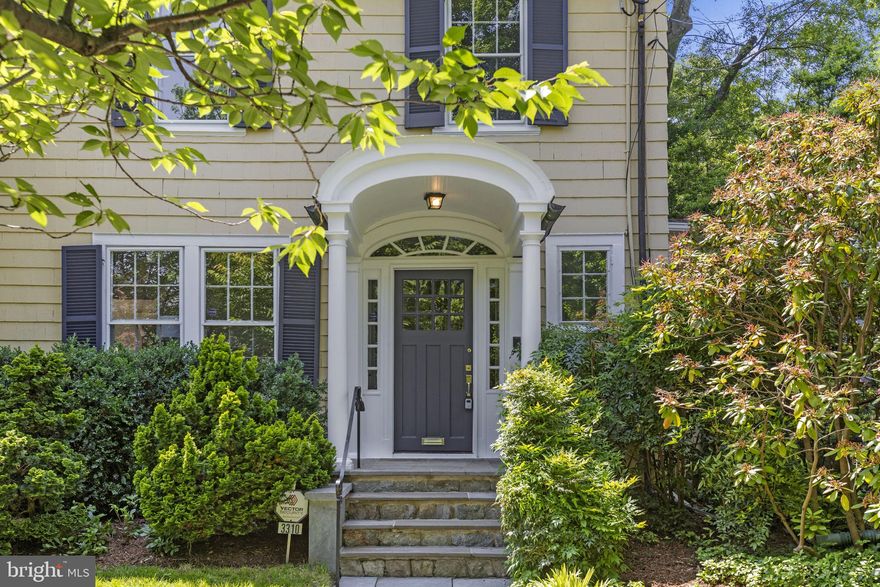 Welcome to 3310 35th Street NW, a timeless gem nestled in the heart of Washington, D.C.'s esteemed Cleveland Park neighborhood. This stately residence, with its rich architectural heritage, exudes an elegance and charm that is both captivating and inviting.

As you approach this distinguished property, you are greeted by a beautifully manicured front garden, its vibrant blooms and lush greenery offering a serene prelude to the grandeur within. The classic brick facade, adorned with ivy and framed by mature trees, speaks of a bygone era of craftsmanship and meticulous attention to detail.

Step inside, and the warm embrace of transitional lines and historic design envelops you. The grand foyer, with its spiraling staircase and built in bench sets the tone for the rest of the home. To your left, the formal living room invites you in with its expansive windows, flooding the space with natural light and offering picturesque views of the surrounding neighborhood. A stately fireplace with surrounding builtins serves as the room's centerpiece.

Adjacent to the living room is the elegant dining room, a space designed for both grand celebrations and intimate family dinners. The room's large windows provide a beautiful backdrop for your dining experience.

The heart of the home is undoubtedly the great room with it's soaring ceilings, atrium of windows and double french doors leading to the backyard oasis, a private haven for relaxation and entertainment. The stone patio, shaded by mature trees, is perfect for al fresco dining and summer barbecues. The lush lawn and garden beds provide a beautiful setting for outdoor activities and gardening enthusiasts.

The chefs kitchen offers commercial appliances, an eat in dining space, and beautiful natural light flooding the breakfast nook.

The second floor is a sanctuary of comfort and luxury. The primary suite is a true retreat, boasting a spacious bedroom, a walk-in closet, and a spa-like ensuite bathroom. Three additional bedrooms, each with its own unique charm, provide ample space for family and guests. A second full bathroom, equally well-appointed, serves these bedrooms with style and grace.

The lower level of this home is a versatile space that can be tailored to suit your needs. Whether you envision a cozy family room, a home office, or a personal gym, the possibilities are endless. A full bathroom and ample storage complete this level.

Located in one of Washington, D.C.'s most sought-after neighborhoods, 3310 35th Street NW offers the perfect blend of historic charm and modern convenience. With close proximity to top-rated schools, fine dining, shopping, and the scenic beauty of Rock Creek Park, this home truly has it all.

Discover the elegance, comfort, and timeless appeal of this remarkable residence. Welcome to your new home at 3310 35th Street NW.