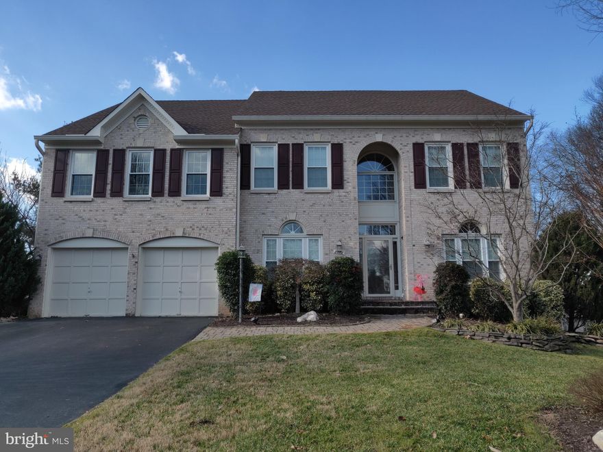 Luxury three level colonial around 5,000 SF living space. Grand 2 story family room, 2 story foyer, beautifully updated kitchen with exotic granite, glazed cabinetry and stainless appliances! Large home office, finished walkout basement with rec room, separate media room, 5th bedroom, full bath & lots of storage. New water heater, new HVACs. New carpet in Rec. room. Spectacular master bedroom suite with large sitting room, oversized walk-in closet & remodeled master bath! Over-sized deck and patio back to trees. New family room ceiling fan to be installed.  Located in quiet cul de sac. Easy access to RT 289 and and other major roads, close to Lakes. Don't mis it.