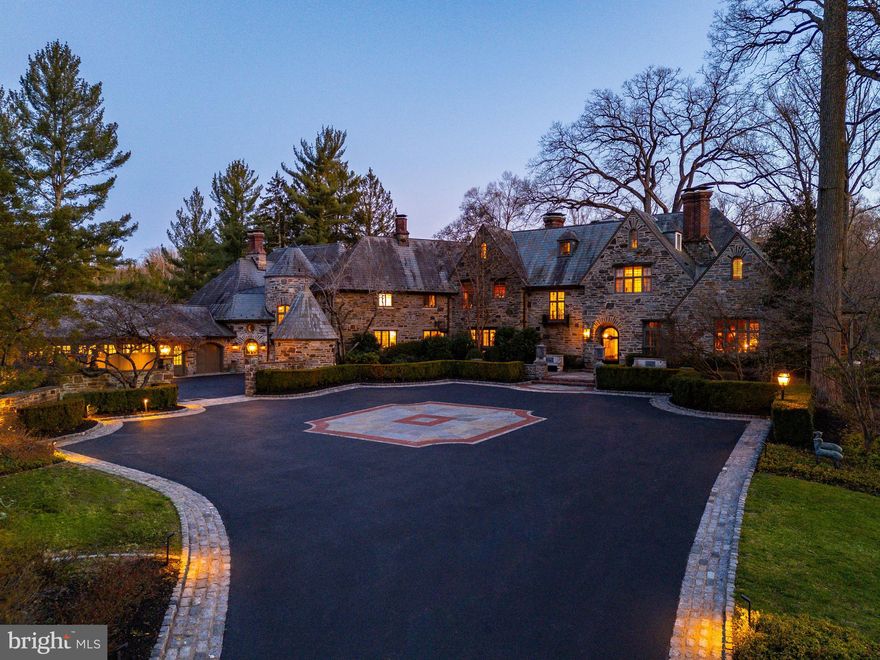 Based upon a successful appeal, the total annual taxes with the new assessment are $80,369, based on current millages at face value.  "Wooded Hill",  a quintessential Main Line estate,  perfectly combines architectural grandeur with luxurious amenities to create an unrivaled oasis in a coveted Gladwyne location. Tucked away behind stone piers and custom entrance gates, this magazine-worthy residence is majestically sited on nearly 7 acres. The estate grounds feature stately mature trees, specimen plantings, flagstone terraces and a large walled motor court. The 16,410 sq ft main residence has been exquisitely expanded and meticulously renovated to reflect the floor plan and design features sought by modern families; with 8 bedrooms total, including the 2 bedroom apartment. Old world elegance includes handsome millwork, lovely ceiling designs, decorative iron staircase railings, countless French doors, 7 charming fireplaces that have been converted to gas, and the highest-grade fit and finishes. Generous windows throughout brighten the interiors with natural sunlight. The beauty is not just in the details, but on display in every room and out of every window. Some highlights include a Mercer tiled reception hall, grandly proportioned living & dining rooms, a gourmet kitchen with adjacent breakfast room, a sunroom, billiards room, two family rooms and two home offices. A private sanctuary, the luxurious primary bedroom suite includes his and her spa-like baths, a sitting area and is enhanced with a library balcony overlooking a two-story family room. Five other generously sized bedroom suites are beautifully appointed, served by outfitted walk-in closets, upscale private baths and sitting/homework areas. A second floor library/sitting room is an ideal area for homework or relaxation. The expansive day lit, walk-out lower level has a custom home bar, exercise room, home theater with stadium seating, full bathroom and convenient access to the swimming pool and grounds. Accommodations for the staff include a two bedroom suite, living room, kitchen, dining area and bathroom. Additionally, the home offers a full house generator (Cummins 100kw) and a Control 4 smart home system providing convenient management of lighting, music, security, and pool systems.  Approached through a stone walled courtyard, the stunning 2 bedroom guest house has been recently renovated with contemporary designer finishes. Breathtaking estate grounds provide endless opportunities for recreation, entertainment or relaxation. You'll enjoy a sparkling swimming pool and nearby pavilion, numerous stone and brick patios offering a variety of commanding viewpoints, enchanting crushed stone pathways and exterior landscape lighting. A substantial level area of the grounds are perfect sports fields, and currently include a golf green plus three separate tee boxes. This idyllic retreat makes it easy to forget how centrally located you are in proximity to Gladwyne Village, King of Prussia, Center City and all major transportation routes.