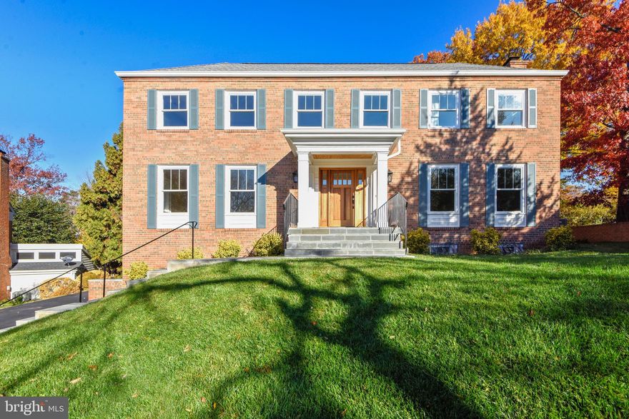 Amazing transformation of this stately brick colonial sitting on the end of a cul-de-sac just a short distance from shopping, dining, Alexandria Hospital and major arteries. This home features six bedrooms each with en-suite bath.  This home has been completely rebuilt from the ground up including new drywall throughout, new windows, new flooring, new chef's kitchen, new elevator, new everything! Entering the house from the side-load 2-car garage to a highly functional mudroom with coat hooks and laundry. The lower level features a bedroom with ensuite bath as well as a media room and family room with wet bar. Granite counters and new wood and glass cabinet adorn the bar area. There is also an elevator which makes moving about the house relatively easy for those with disabilities. Moving to the main level continues with beautiful finishes and well-thought out spaces. The main entrance opens to a lovely foyer and sweeping staircase leading to the second floor. As you enter the home, beautiful hardwood floors adorn the level including the living room with wood-burning fireplace which is to your right. To your left as you enter is the large dining room which has plenty of room for large gatherings. Off the dining room towards the kitchen is a pantry sure to be the envy of the neighborhood. The spacious chef's kitchen features two ovens, large island and enough cabinet space for almost any need. The kitchen walks out to the back patio or to the main-level family room. Off the family room sits a generously-sized bedroom with ensuite bath. Off the back of the family room is a wonderful sunroom with new ceramic tile that walks out to the spacious patio. The second floor features four bedrooms with hardwood floors, each with ensuite bath. The master has two walk-in closets, large, well-appointed bath with separate tub and shower. Also, sitting off the master is a bonus room great for an office, nursery, gym, or anything you can think of. The bonus room also walks out to a second floor deck overlooking the expansive backyard. Incredible features and incredible finishes make this house a special place to call home.