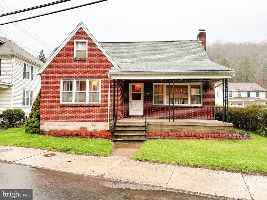 Picture Perfect! This lovey Lonaconing Cape Cod has been in the same family since built in 1956! And oh, so much charm! Lovely woodwork throughout, original hardwood floors, an adorable vintage kitchen, the prettiest pastel pink bathroom, and so much more! 3 bedrooms, 2 full bathrooms, Spacious rooms throughout, cozy fireplace, adorable entryway, fabulous front porch, tons of closet space, a very usable basement, a HUGE detached garage with bonus room, and so much more!! Don't miss this one! Houses this cute don't stay on the market long!
