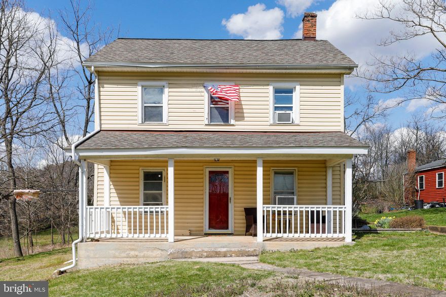 Charming colonial home situated on 2 acres of land! Featuring 4 bedrooms, 2 full baths. Main level offers a living room with electric fireplace. Eat-in kitchen with pantry and ample cabinetry & table space. Entry-level bedroom. Remaining three bedrooms on upper level. Home roof replaced in Dec 2019.  Outbuilding roof brand new as of March 2024. Water heater replaced Nov 2023. Spacious front porch to enjoy the outdoors. Detached studio currently used as a business, equipped with a half bath and storage room. Attached storage shed with electric. Great countryside setting, yet not too far from stores, dining, and parks.